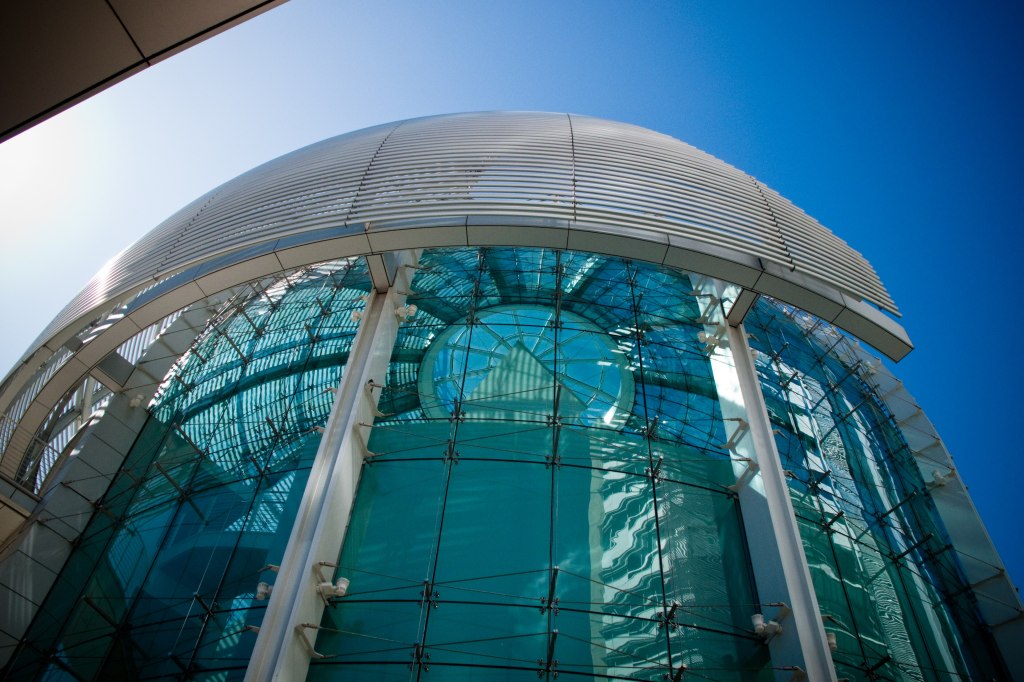 San Jose City Hall tower and rotunda against a blue sky