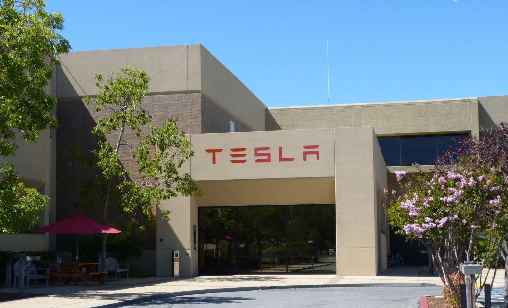 Exterior of the Tesla Motors headquarters building in Palo Alto with a Tesla sign, 2010