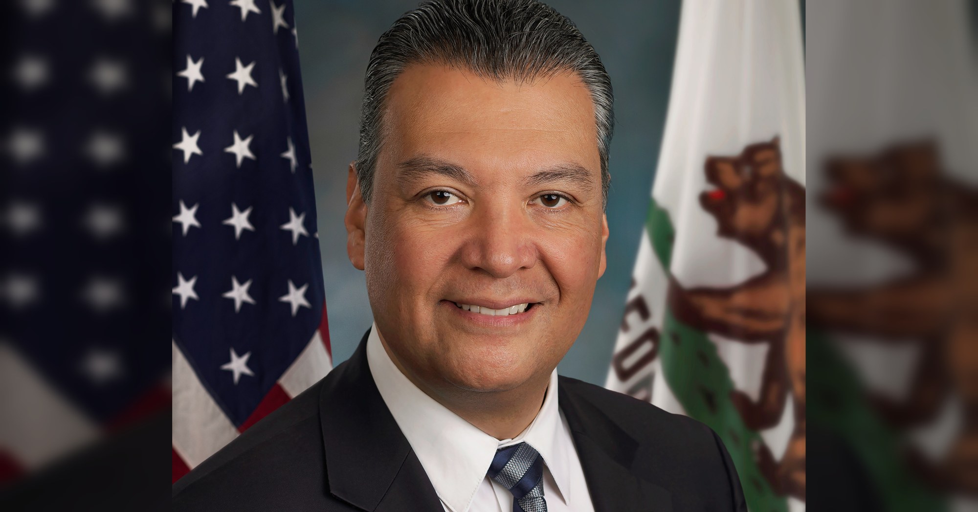 Official Senate portrait of Alex Padilla in front of an American flag.