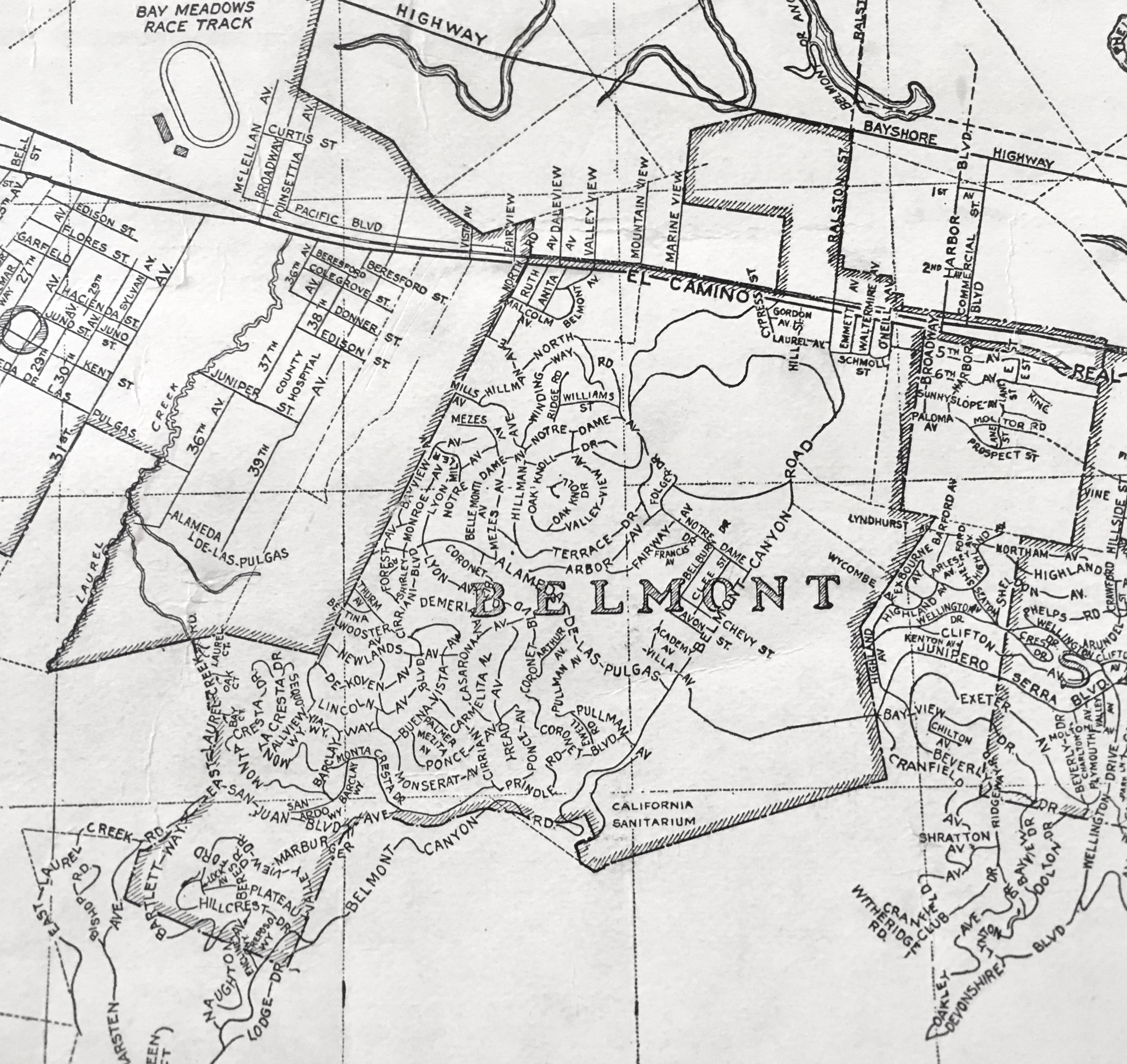 A black-and-white 1937 map showing the streets of Belmont, California and surrounding hills