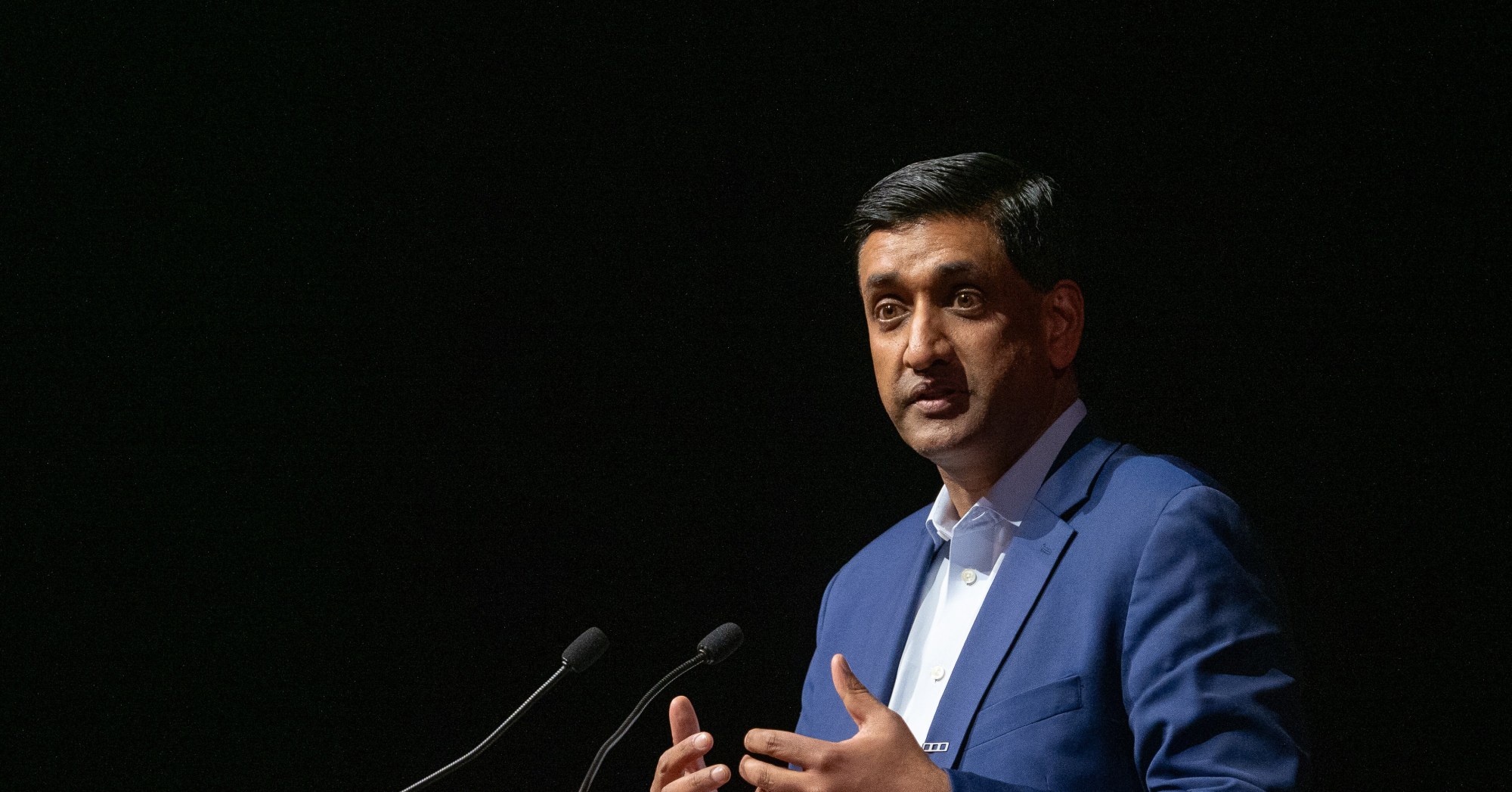 Rep. Ro Khanna speaking into a microphone at a Stanford University event in February 2026.