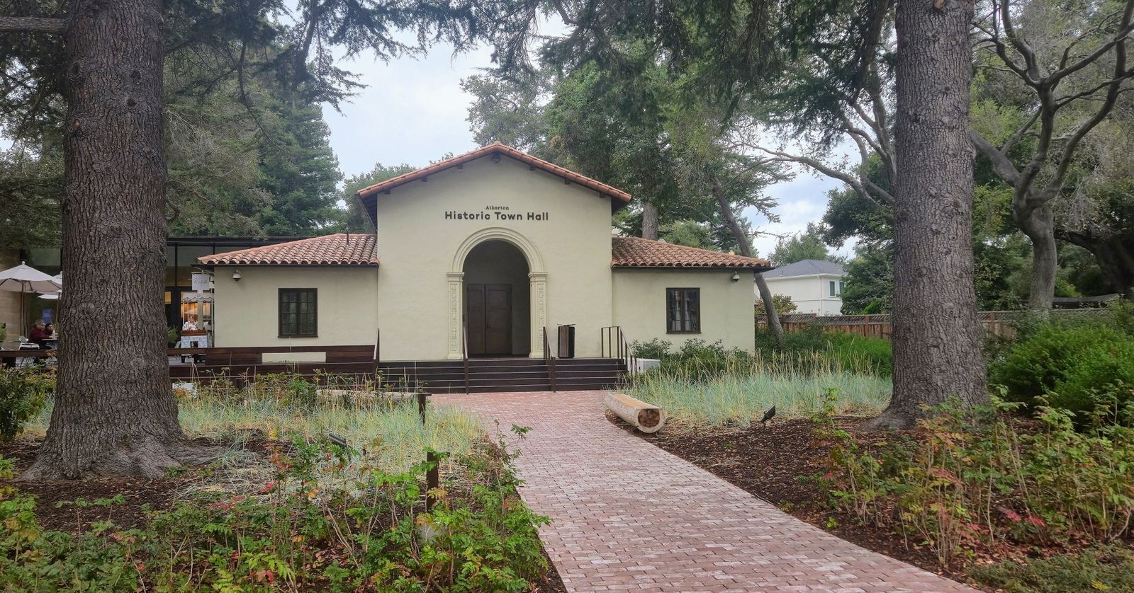 Atherton's historic Town Hall, a Spanish-style building surrounded by trees