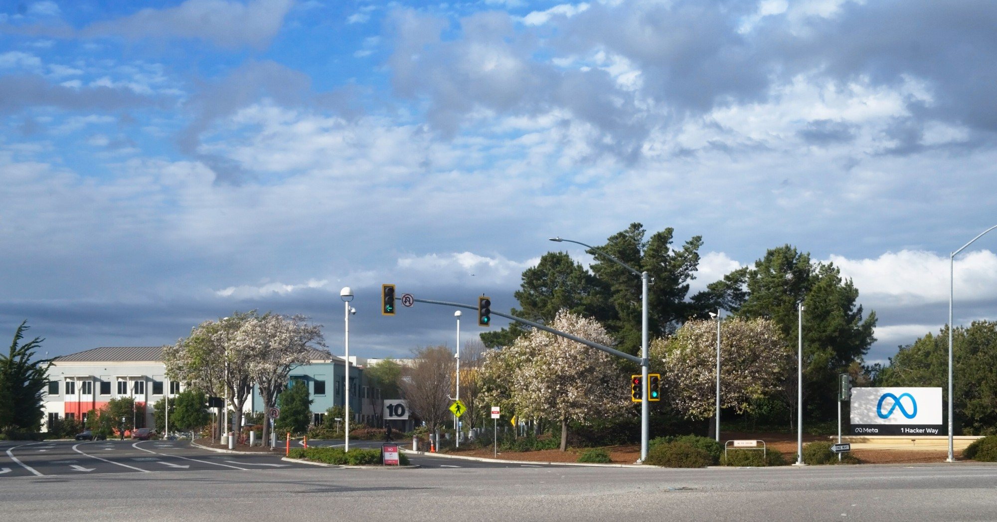 The Meta entrance sign with its infinity logo at the company's Menlo Park headquarters